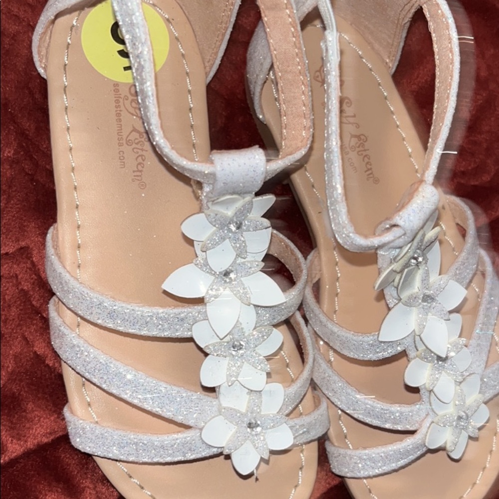 Soft pink sandals and white sandals with glitter and flowers. Never worn